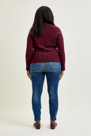 Joey Mid Rise Skinny Jeans With Handsand - PLUS